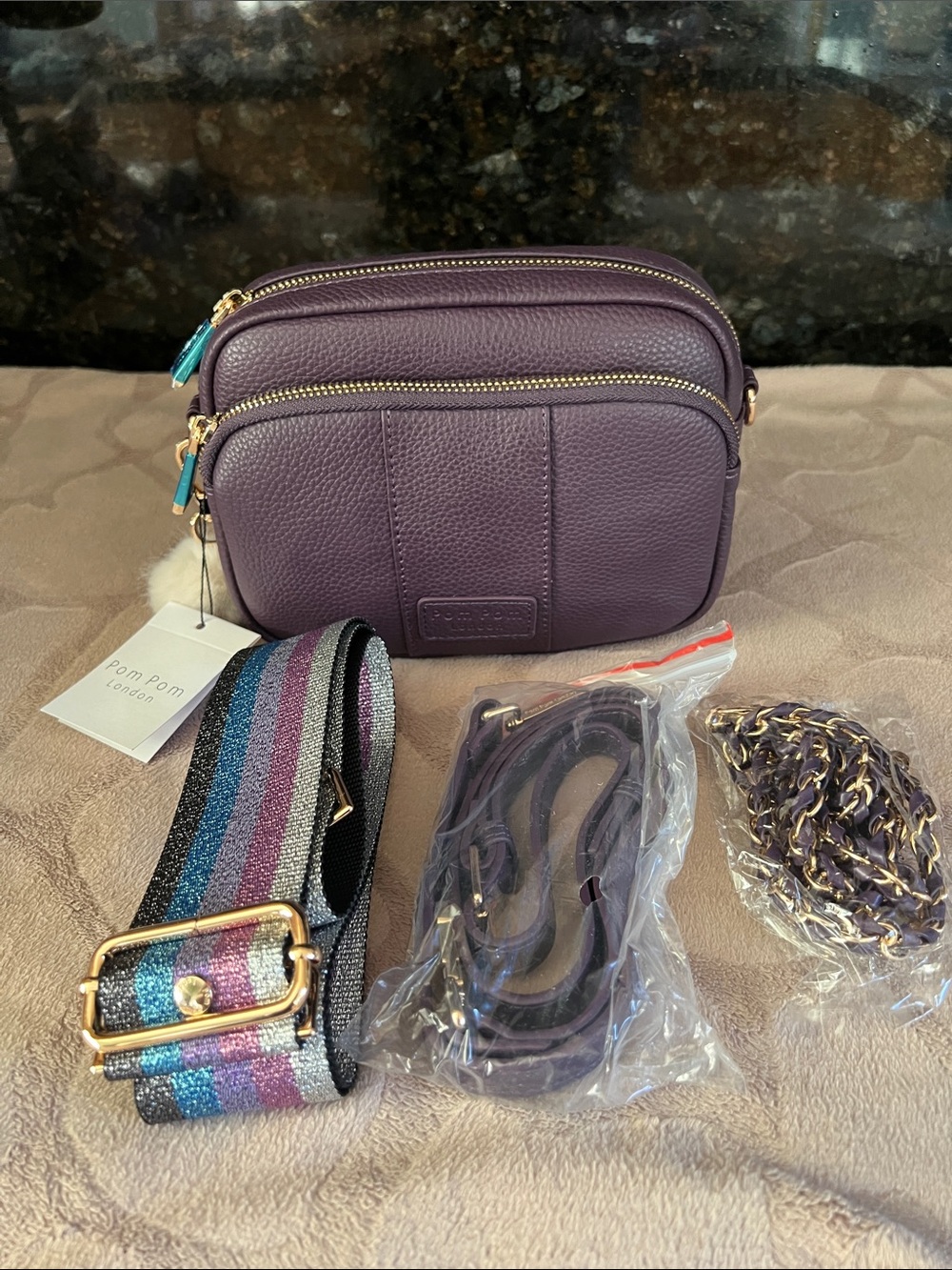 Pom Pom London Purple Pebbled Leather Crossbody Bag with Striped Strap